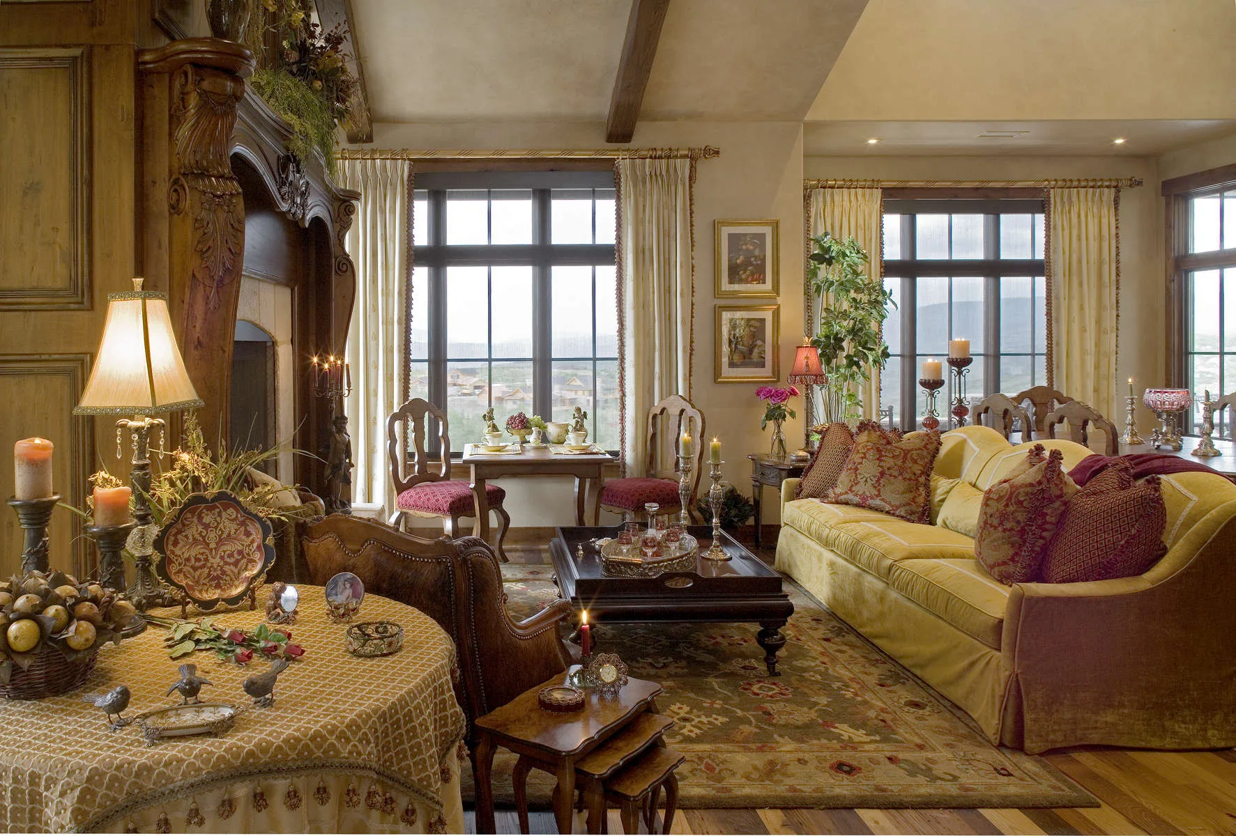 Living room with floral drapes, traditional upholstered furniture and large windows
