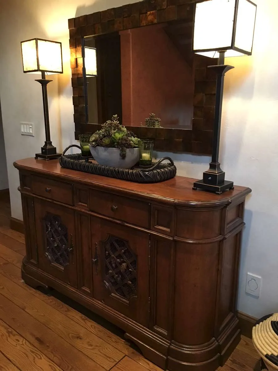 Custom wood dresser with a mirror and matching table lamps